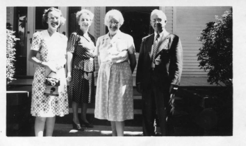 Nestor and Covey family - three women and one man smiling at the camera 1930s